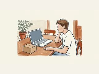 Persona ante un portátil de pantalla vacía y una caja sin etiqueta en una mesa doméstica.