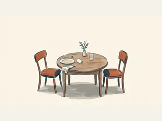Una mesa de almuerzo preparada con dos sillas, un plato, un vaso y una tarjeta sin texto.