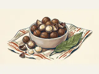 Un cuenco de macadamias con cáscara y abiertas sobre una tela junto a hojas verdes.