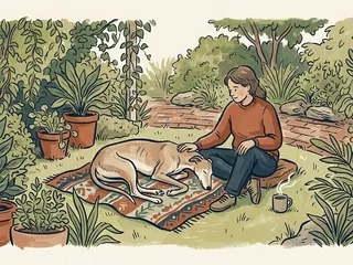 Un galgo descansa sobre una manta junto a una persona en un jardín ficticio.